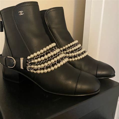 chanel black boots|Chanel boots with pearl heel.